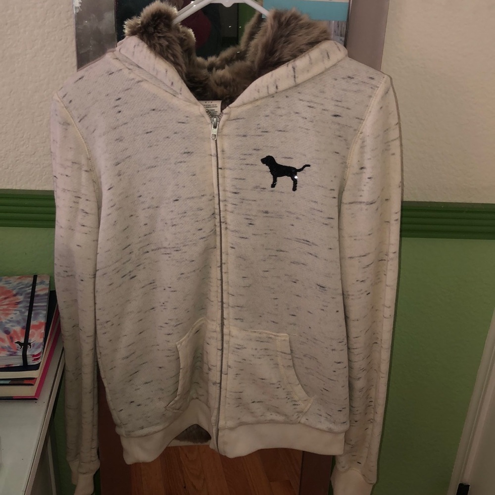 Pink jacket with fur on the inside & sparkle logo